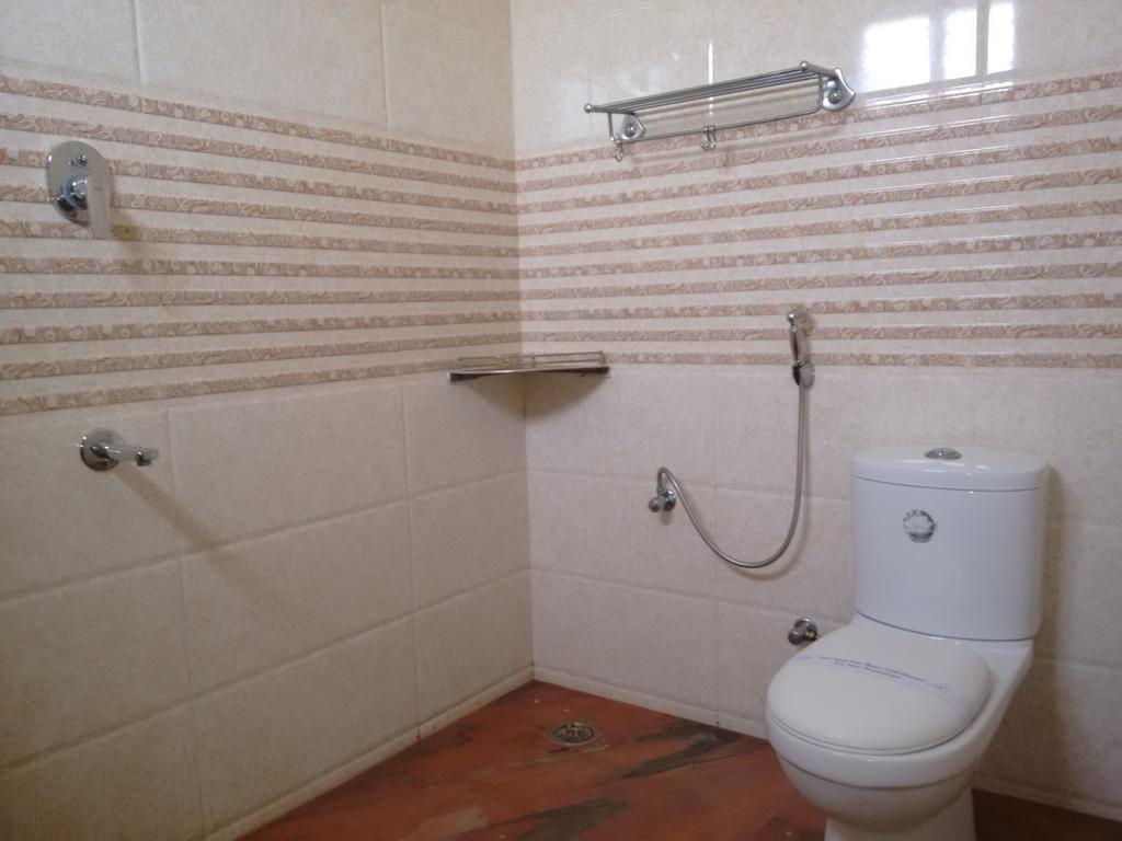 קניאקומרי Hotel Chithra חדר תמונה