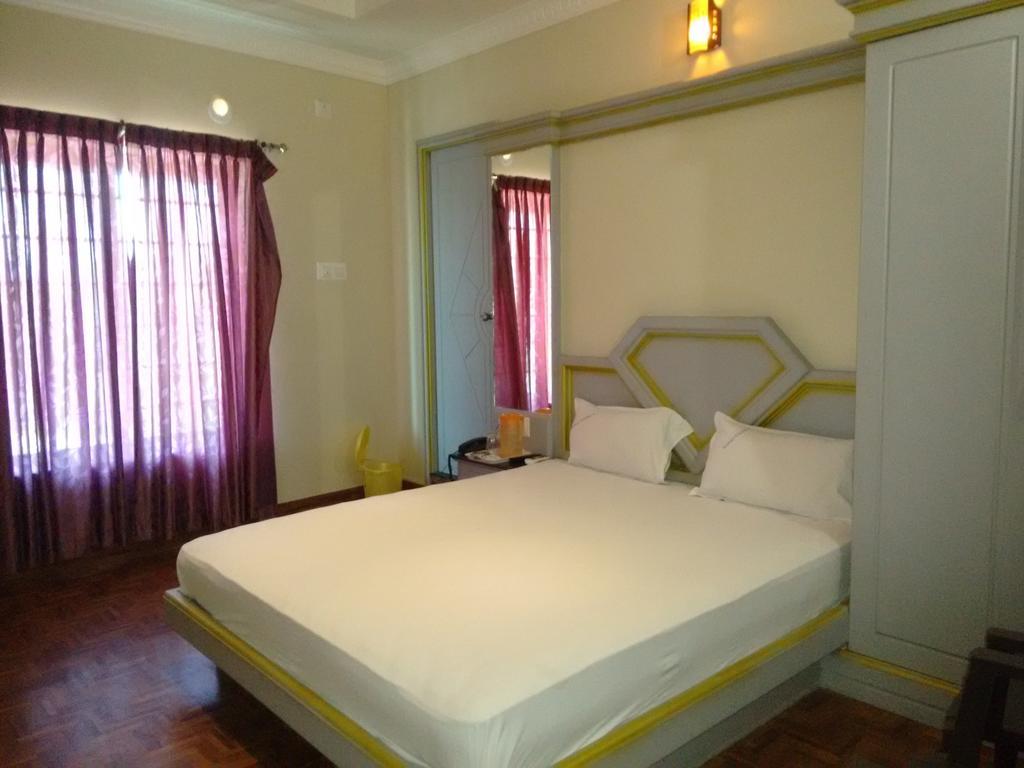 קניאקומרי Hotel Chithra חדר תמונה